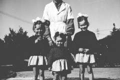 Unknown man and children